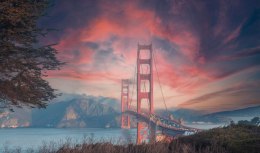 Fototapeta Beautiful View Of Golden Gate Bridge In Background Of Mountains During Sunset